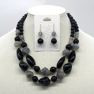 Water drop acrylic pendants necklace with matching earrings.